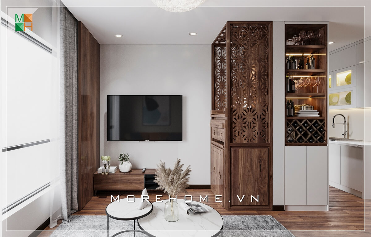 Mẫu kệ tivi gỗ tự nhiên tuy đơn giản nhưng cũng hết sức tinh tế và tiện nghi khiến căn phòng khách chung cư trở nên sang trọng hơn. Thiết kế khách chung cư